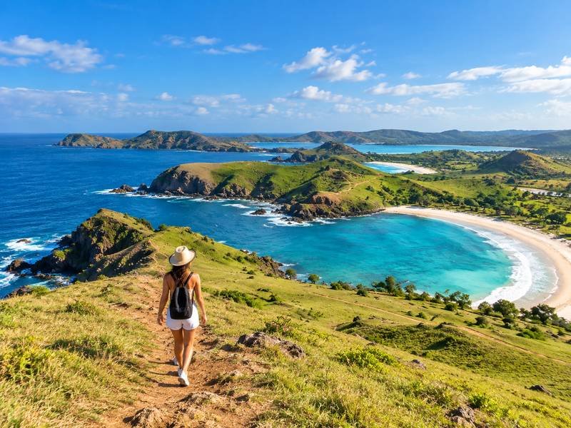 Walking across Bukit Merese with Tanjung Aan coastline below